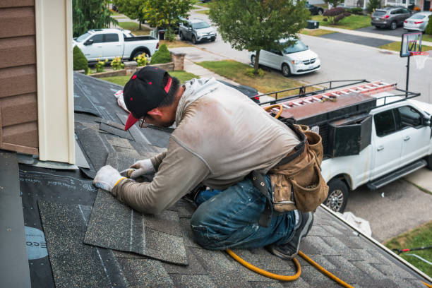 Professional Flat Roof Repair technician working in Robins, IA